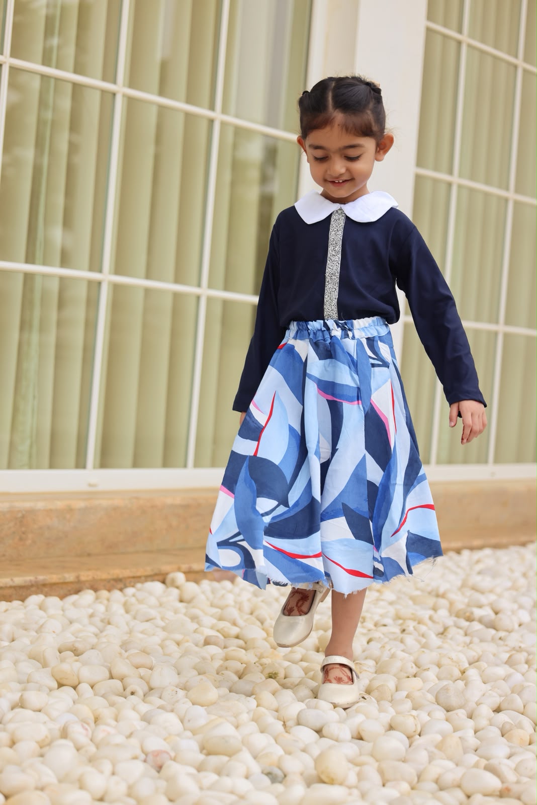 Navy collared top with printed skirt